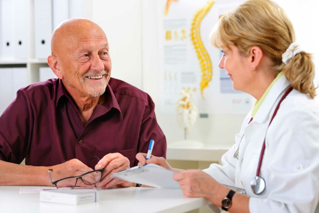 Older patient with doctor