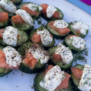 Cucumber appetizer bites on with plate