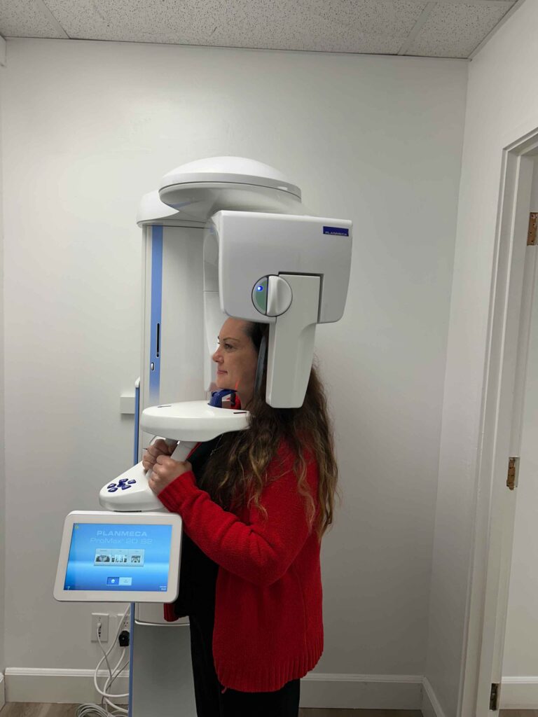 woman standing in a 360 head scan